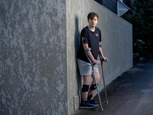 Fifteen-year-old NDIS participant Hamish Lilley is unable to get new leg supports, which cost upwards of $12,500. Picture: Richard Walker