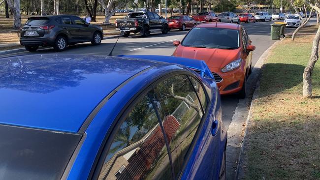 Cars parked along both sides of Balcara Ave, near the park 'n' ride facility at Carseldine train station. Picture: David Willoughby