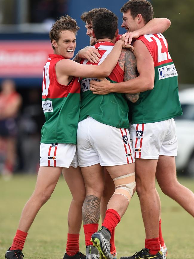 MPNFL Division 1: Mt Eliza v Frankston Pines.Frankston Pines #27 Aaron Edwards celebrates a goal with team mates.Picture: Jason SammonSaturday 14 April 2018