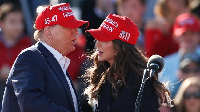 Self-eliminated pick: Donald Trump with Kristi Noem. Bragging about shooting her puppy in a gravel pit ended the North Dakota Governor’s hopes of being selected. Picture:AFP