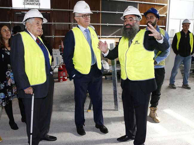 Harry Triguboff, Prime Minister Malcolm Turnbull and Rabbi Dovid Slavin inspect the Synnagouge refurbishments at the Yeshiva centre in Bondi before heading down to Our Big kitchen. Picture: John Appleyard