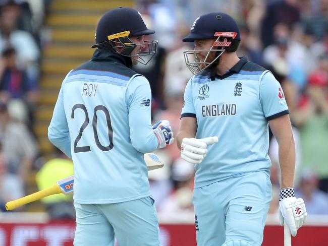 England's Jason Roy, left, celebrates with batting partner Jonny Bairstow after hitting a boundary during the Cricket World Cup semi-final match between England and Australia at Edgbaston in Birmingham, England, Thursday, July 11, 2019. (AP Photo/Aijaz Rahi)