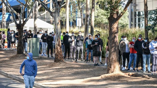 People queue for their jab at the NSW Vaccine Centre at Homebush, Sydney, on August 15. Picture: NCA NewsWire / Flavio Brancaleone