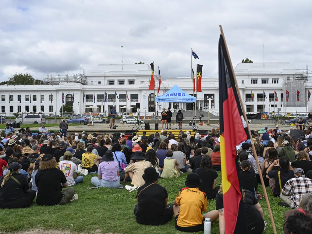 Indigenous flags were held up at the rally in Canberra. Picture: NewsWire / Martin Ollman