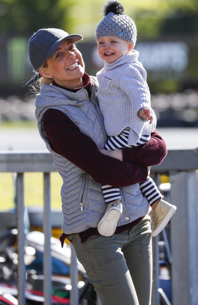 Carrie Bickmore laughs as she strolls with Evie on a recent play date.