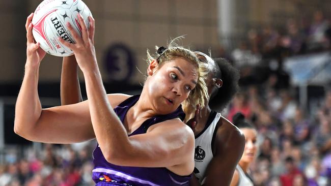 Donnell Wallam of the Firebirds controls the ball under pressure during the round six Super Netball match between Queensland Firebirds and Collingwood Magpies. Picture: Albert Perez/Getty Images