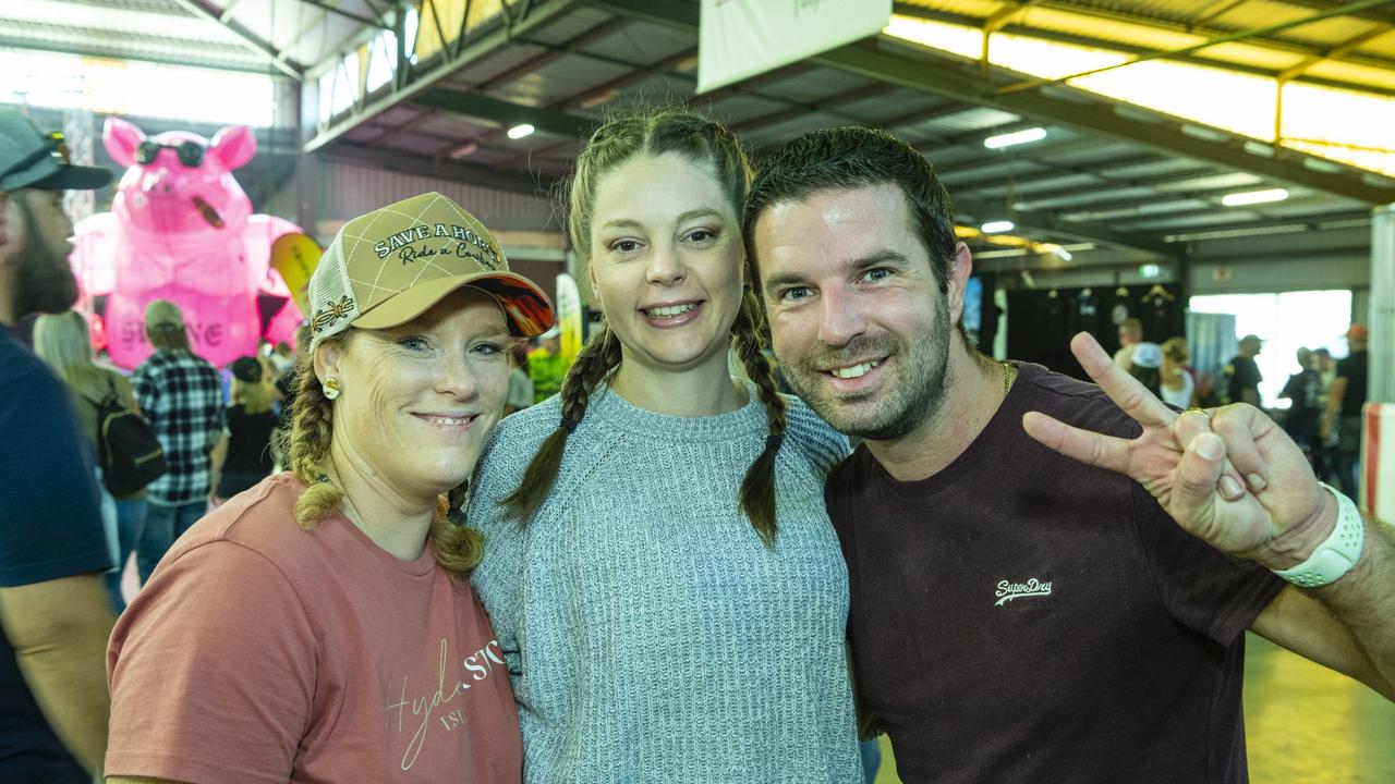 At Meatstock are (from left) Christie Ward, Crystal Irvine and Stephen Irvine at Toowoomba Showgrounds, Friday, April 8, 2022. Picture: Kevin Farmer