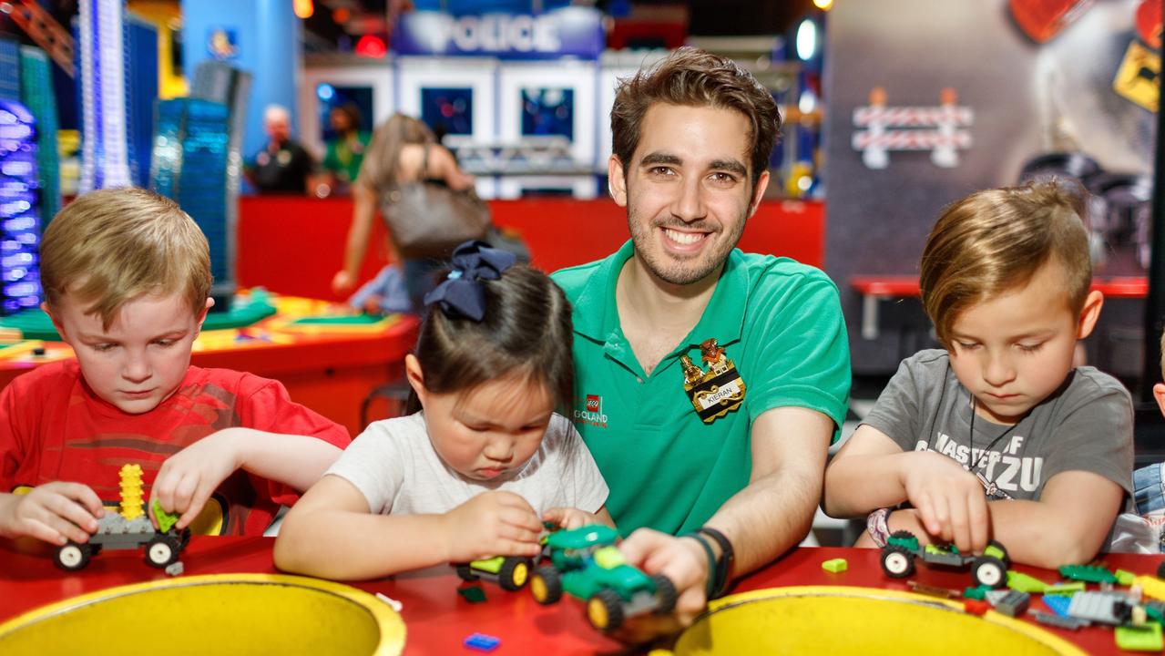 Lego Master Builder Kieran Jiwa with young builders at Legoland Discovery Centre. Picture: supplied