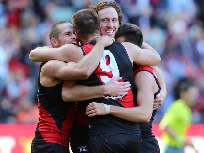 David Zaharakis, Brendon Goddard and Mitch Brown celebrate the win after the siren. Picture: Alex Coppel.