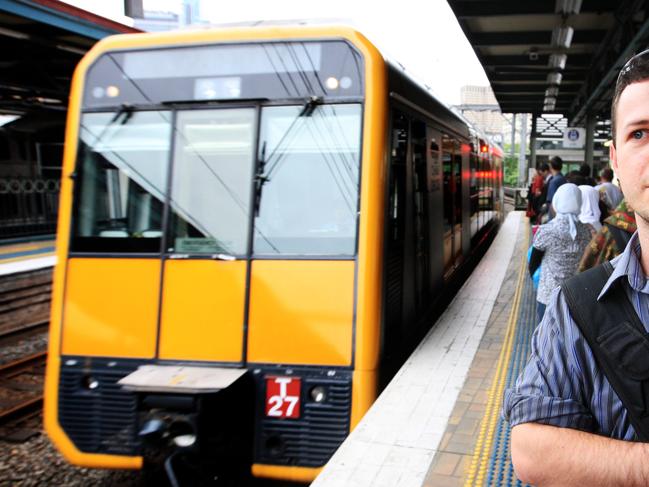 Adam Kirk, 23 from Bankstown - Passengers on platform 22 of Central Station, Sydney. The demand for City Rail services is increasing.