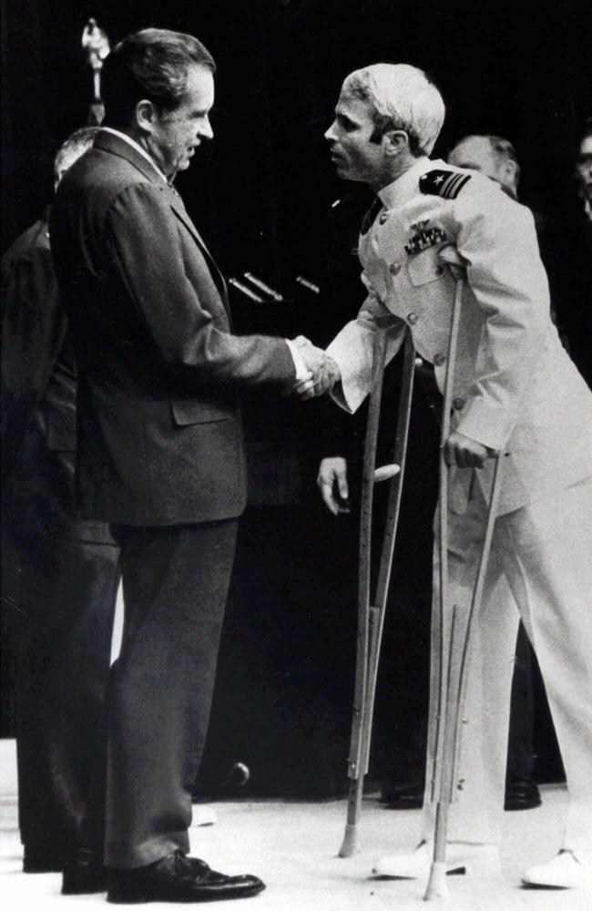 USA Liaison Officer John McCain being greeted by President Richard Nixon in 1973 after his release from five years in Vietnamese prisoner of war camp. Picture: AP