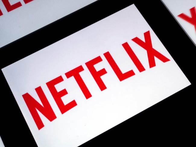 (FILES) This file photo taken on February 18, 2019 shows the US Online Streaming giant Netflix logo displayed on a tablet in Paris. - Netflix has sealed an agreement with French television channel 'Canal Plus' to have its program offers distributed in France, the two groups announced on September 16, 2019 during a press conference. The platform has already a similar cooperation with Sky in Germany and in the United Kingdom. (Photo by Lionel BONAVENTURE / AFP)