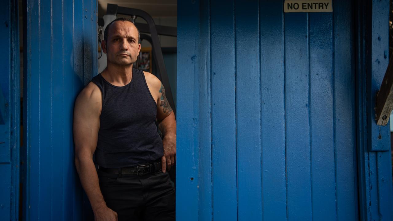 Jim Taousanis pictured at his gym in Scarborough, Queensland has written a book about his time in the Underbelly scene. Picture: Brad Fleet