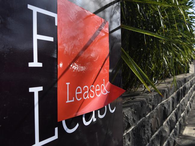 Signage for a real estate property is seen in Carlton North, Melbourne, Wednesday, July 18, 2018. (AAP Image/James Ross) NO ARCHIVING