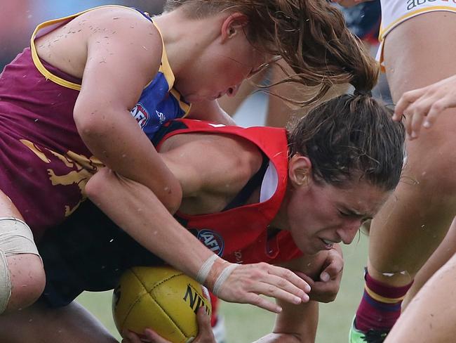 Melbourne’s Cat Phillips is tackled by Brisbane opponent Megan Hunt. Picture: Wayne Ludbey