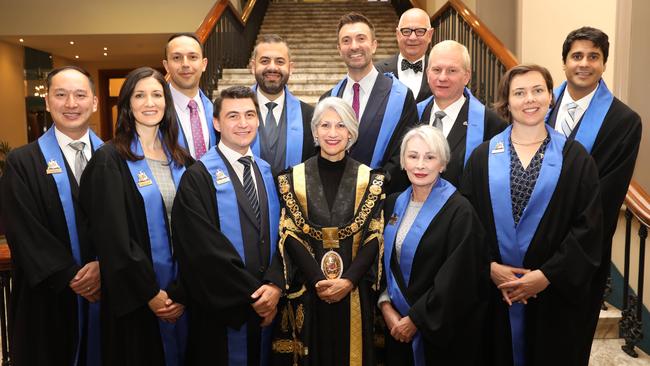 Adelaide City Council: Front: Simon Zou, Mary Couros, Alex Hyde, Lord Mayor Sandy Verschoor, Anne Moran, Helen Donovan. Back: Arman Abrahimzadeh, Houssam Abiad, Robert Simms, Phillip Martin, Franz Knoll, Jessy Khera. Picture: AAP / Russell Millard