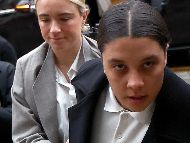 KINGSTON UPON THAMES, ENGLAND - FEBRUARY 3: Australian footballer Sam Kerr and partner Kristie Mewis arrive at Kingston Crown Court on February 3, 2025 in Kingston upon Thames, England. The Matildas star, who also plays professionally for Chelsea in the Women's Super League, is facing charges of "racially aggravated harassment" of a police officer related to an incident in Twickenham on January 30, 2023. (Photo by Peter Nicholls/Getty Images)