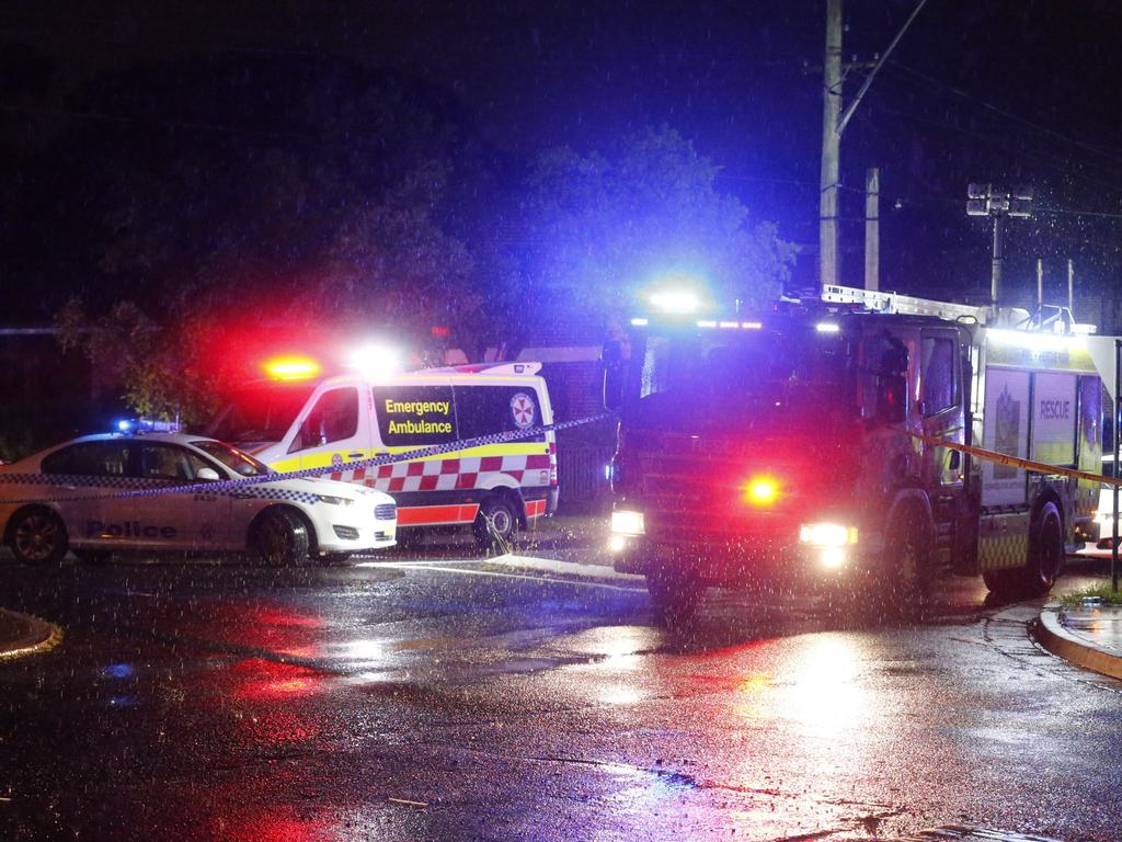 Emergency responders at the scene where the respected pharmacist was electrocuted. Picture: Steve Tyson 