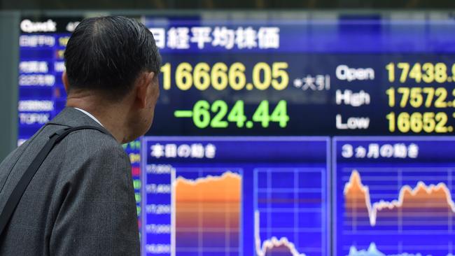 Generations of families here have stashed most of their money in low-yielding savings accounts rather than trying to increase their wealth through the stock market. Picture: AFP