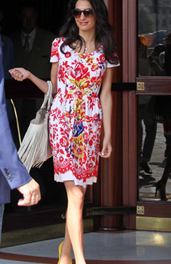 Amal Alamuddin in a floral Oscar de la Renta dress ahead of her wedding. Picture: Getty