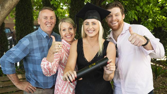 Associate Degree of Education graduate Georgia Marsh celebrates with (from left) Michael Marsh, Skye Marsh and Nick Thom at a UniSQ graduation ceremony at The Empire, Tuesday, October 29, 2024. Picture: Kevin Farmer