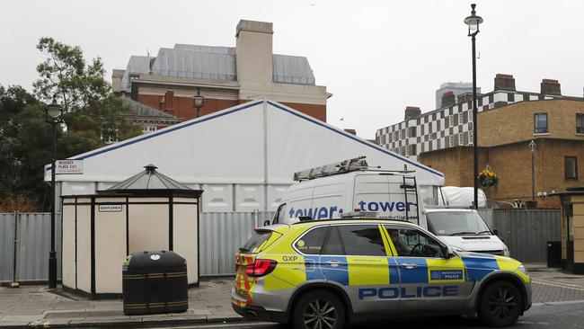 A police car in front of a tent being built as a temporary morgue in London last week. Picture: AP