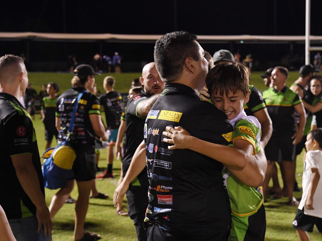 Palmerston Raiders coach Merg Mikaelian hugs his son after winning the NRLNT Grand Final 2022. Picture: (A)manda Parkinson