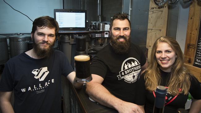 Jacob Gordon (left) was one of the first to pledge support to 4 Brothers Brewings' Brother From Another Mother equity crowdfunding campaign, pictured celebrating with founder Adrian Cubit and Brittany Menzies, Friday, November 1, 2019. Picture: Kevin Farmer