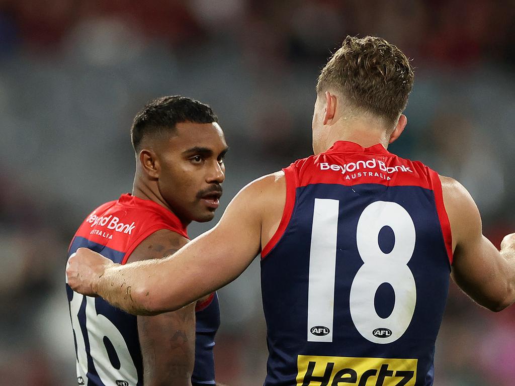 Kysaiah Pickett speaks with Jake Melksham on Saturday night at the MCG. Picture: Kelly Defina/Getty Images.