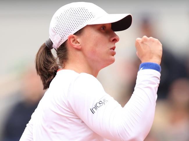 PARIS, FRANCE - JUNE 02: Iga Swiatek of Poland celebrates a point against Anastasia Potapova in the Women's Singles fourth round match during Day Eight of the 2024 French Open at Roland Garros on June 02, 2024 in Paris, France. (Photo by Clive Brunskill/Getty Images)