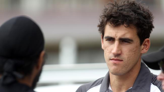 A fresh faced Mitchell Starc chats to Wests teammate Monty Panesar during the 2013-14 season.