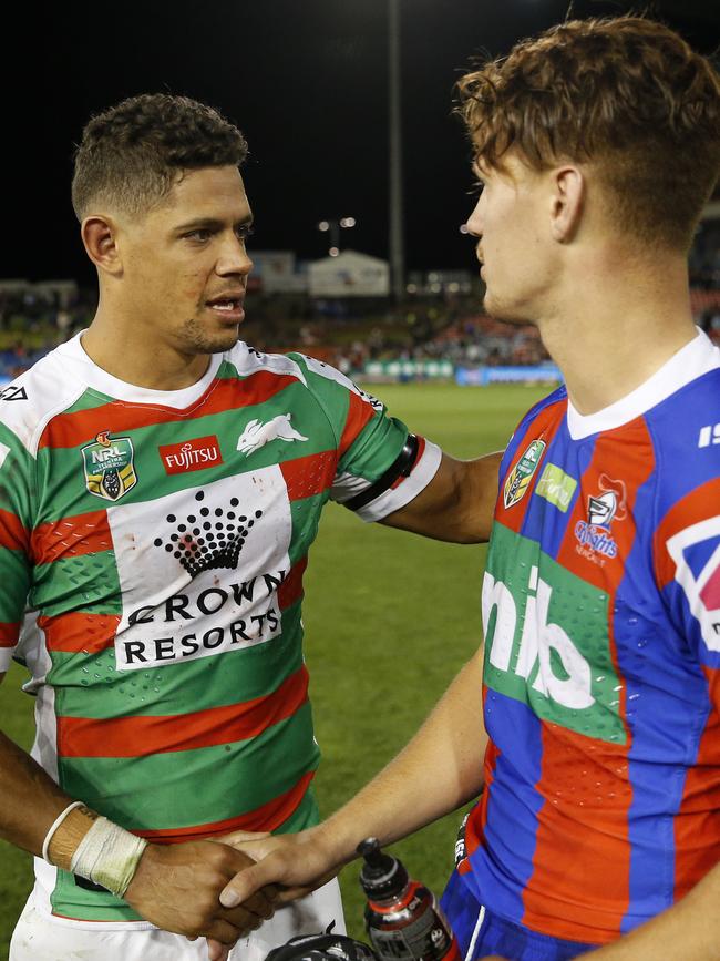 Dane Gagai of the Rabbitohs shakes hands with possible Maroons teammate Kalyn Ponga of the Knights. Picture: AAP Image/Darren Pateman