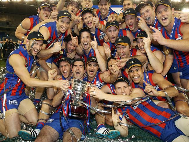 Skipper John Baird comes to grips with the premiership cup in 2011.