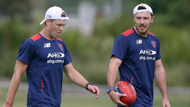 Jake Melksham and Michael Hibberd at Melbourne training on Friday. Picture: Wayne Ludbey