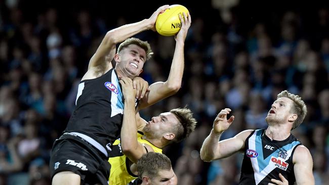 Port Adelaide’s Dougal Howard marks strongly against Richmond in round four. Picture: SAM WUNDKE (AAP).