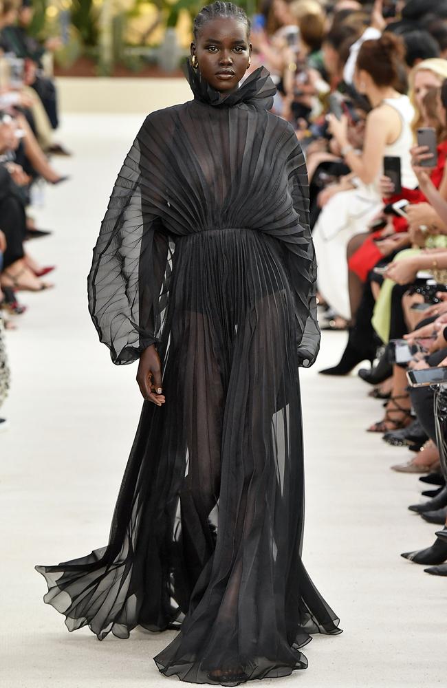 Akech walks on the runway during the Valentino Fashion Show during Paris Fashion Week. Picture: Jonas Gustavsson/Sipa USA.