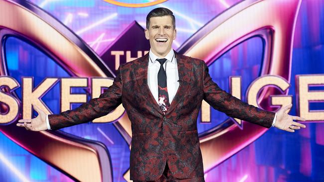 Osher Gunsberg wearing a Wil Valor suit on the set of The Masked Singer.