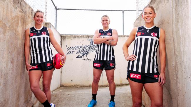 Port Adelaide AFLW captain Janelle Cuthbertson, forward Ashleigh Saint and midfielder Abbey Dowrick in the Power’s prison bar guernsey that will be debuted in the AFLW Showdown for the first time. Photo Matt Sampson