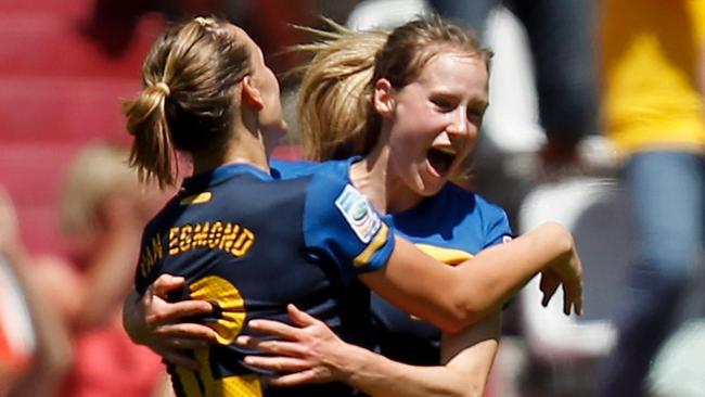 AUGSBURG, GERMANY - JULY 10:  Ellyse Perry (R) of Australia celebrates scoring the first goal with Emily van Egmond (L) during the FIFA Women's World Cup 2011 Quarter Final match between Sweden and Australia at the FIFA Women's World Cup Stadium Augsburg on July 10, 2011 in Augsburg, Germany.  (Photo by Friedemann Vogel/Getty Images)