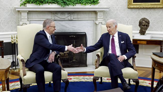 Prime Minister Anthony Albanese and US President Joe Biden shake hands in the Oval Office before a bilateral meeting at the White House on October 25.