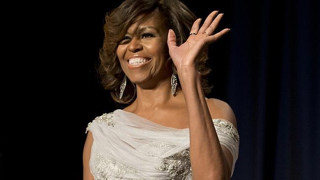 When in doubt, do as Michelle does. Mrs Obama serving first lady black tie realness. (AP