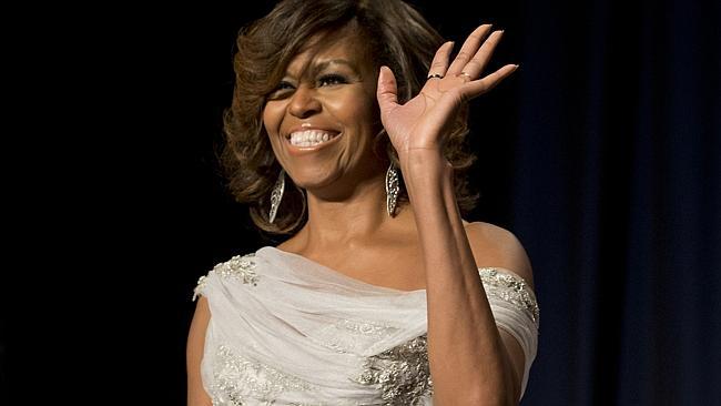 When in doubt, do as Michelle does. Mrs Obama serving first lady black tie realness. (AP 