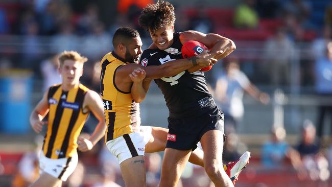 Jack Silvagni is tackled by Jarman Impey. Picture: Getty Images