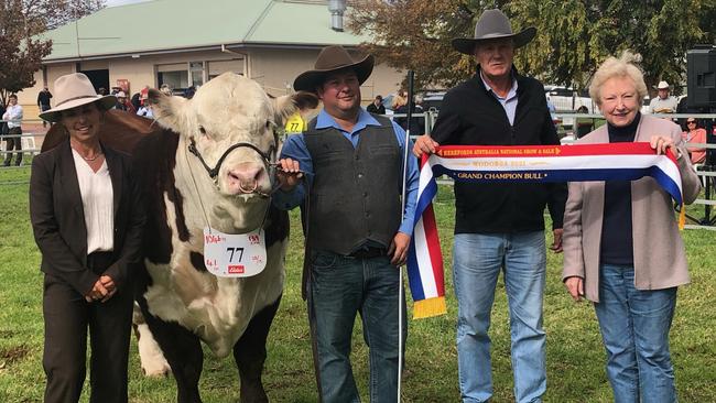 Grand champion Hereford bull Kymarney Maverick Q009 at the Hereford National Show and Sale at Wodonga with judge Erica Halliday, handler Hayden Green, Kymarney principal Scott Lewington and Herefords Australia chair Trish Worth. Picture: Fiona Myers