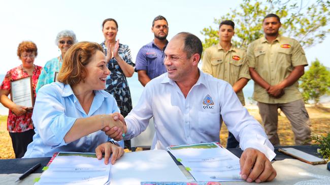 Jackie Trad, Queensland deputy premier at the time, shakes hands with Cameron Costello at the Quandamooka land handover ceremony on Stradbroke Island, Minjerribah in December 2019. Picture: Jack Tran