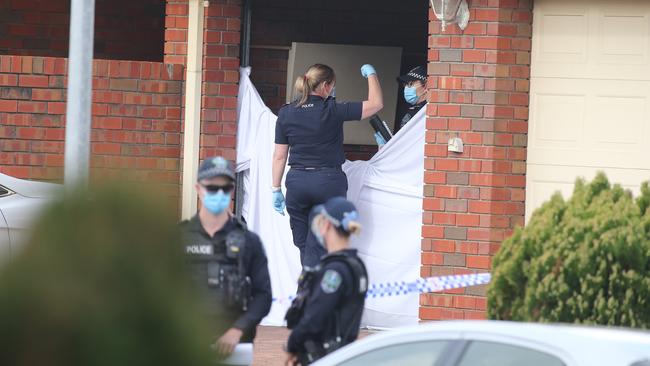 Detectives and police at the scene of a murder-suicide at West Lakes. Picture: Dean Martin