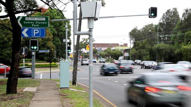 The speed and red light camera on Silverwater Road southbound at Holker Street. Picture: Jonathan Ng