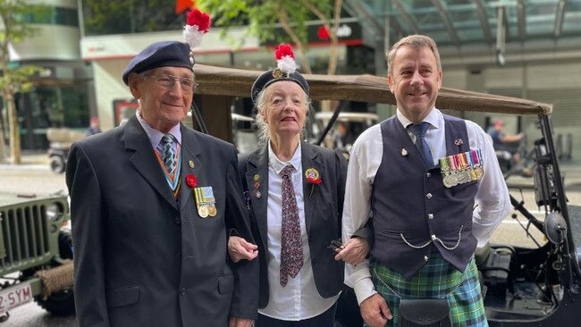 British Ex Services Association veterans Edward Pitt, Brenda Stephens, and DJ Vaughan joined the parade through Brisbane City. Picture: Felicity Ripper