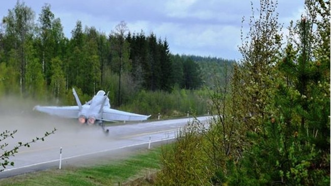 A Finnish Defence Force Jet landing on a rural road. Picture: Finnish Defence Force.