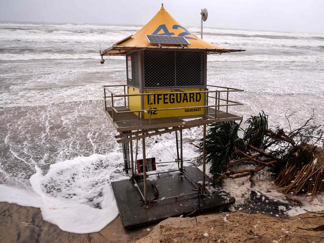 Main Beach is damaged by record-breaking waves as Tropical Cyclone Alfred nears the Gold Coast. Picture: AFP